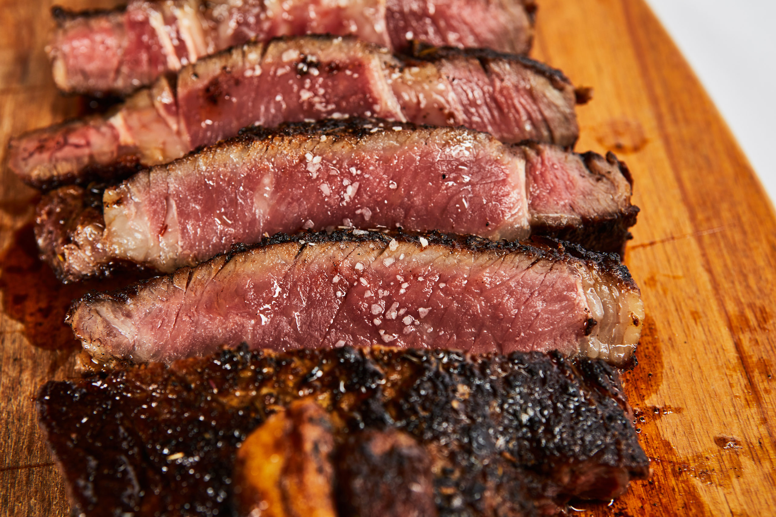 Sliced steak prepared at Blue Restaurant